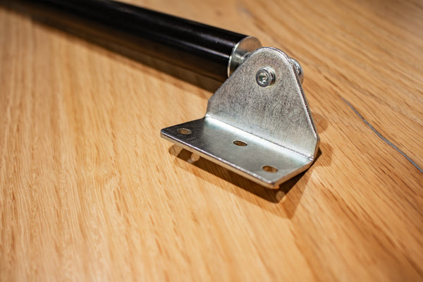 Floor Door Strut with installation plate close-up.