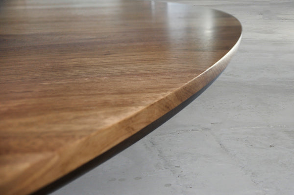CIRCULAR EQUILIBRIUM DINING TABLE